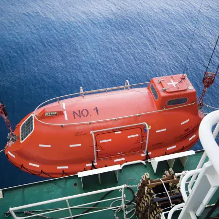 Rescue boat secured on a vessel