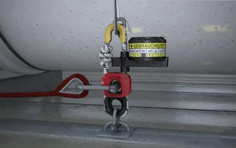 Hydrostatic release unit installed on a life raft cradle