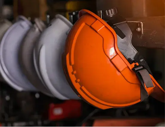 Orange industrial safety helmets